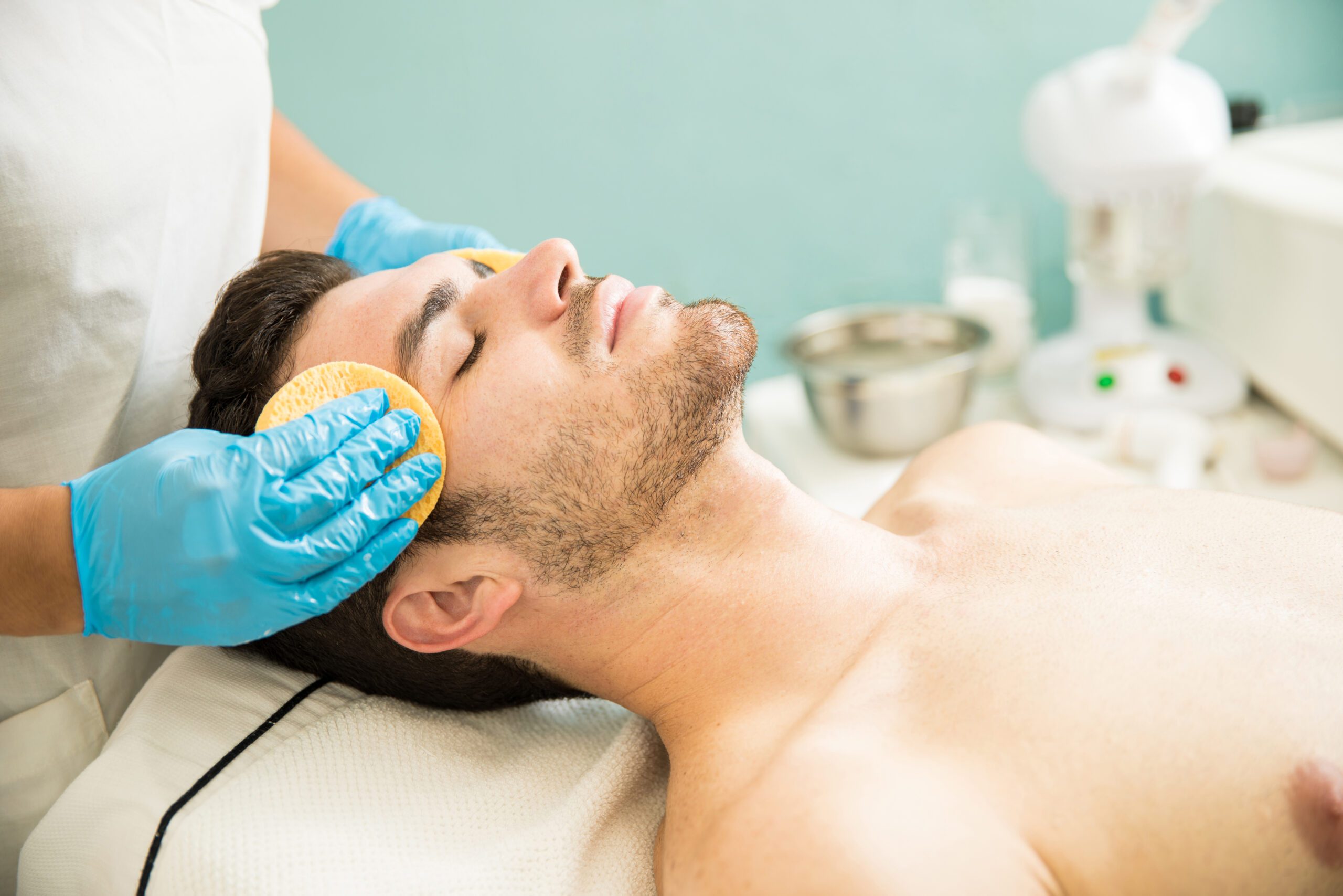 Man getting a facial cleanse
